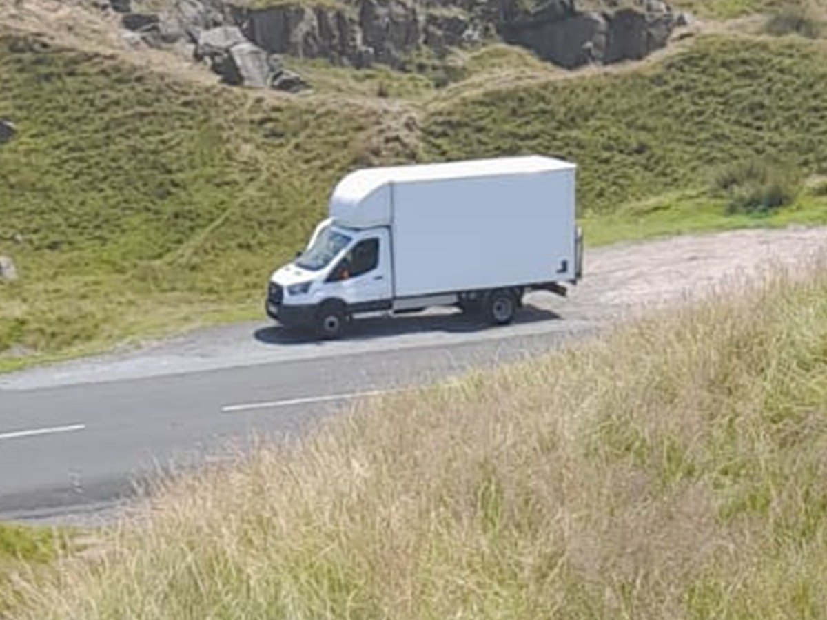 Removal van on the road en route to a delivery